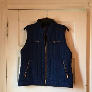 Blue pleated vest